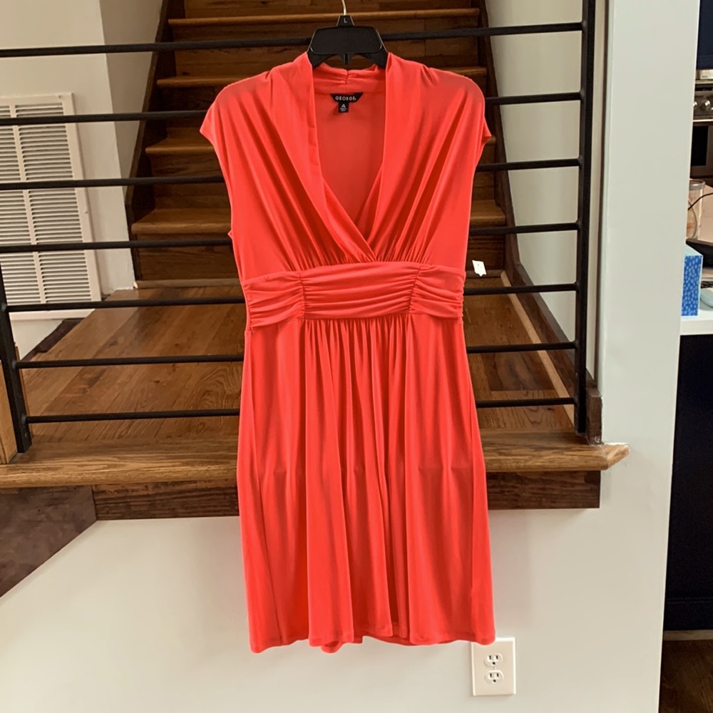 Very feminine coral/watermelon dress. Perfect for Easter or summer wedding
